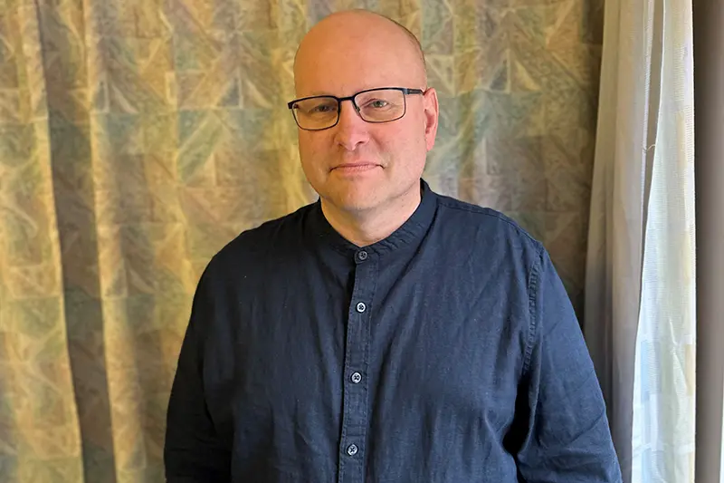 Porträttbild på en man.